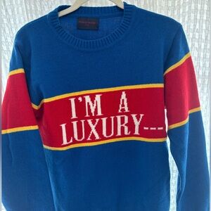 I’m a luxury few can afford sweater